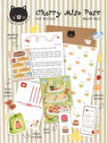 Preview of the March edition of Cherry Miso Post featuring a monthly letter, afternoon tea postcard, mini menu print, vinyl teabag sticker, journal scraps, and an envelope with cute, all on top of a green striped background.